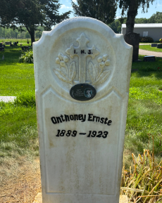 Granite headstone cleaning result for John E., Florida - After