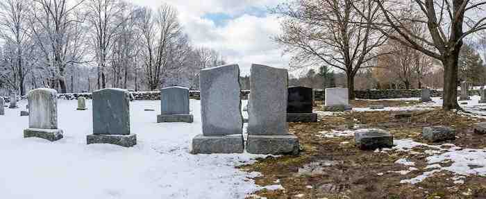 Professional headstone cleaning service in New Hampshire cemetery