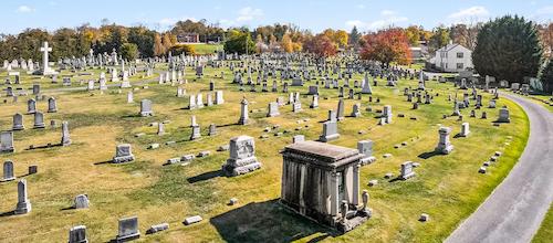 Aerial view of a well-maintained cemetery, highlighting the importance of coordinated third-party grave care.