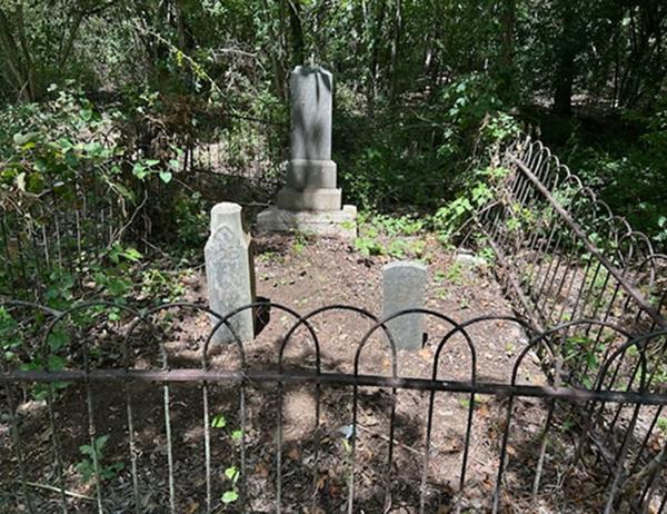 Fallen historical tombstones carefully reset and restored in a Texas cemetery.