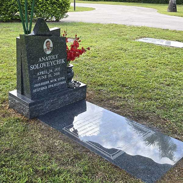 Anatoly's restored headstone after professional cleaning by Tending app contractors