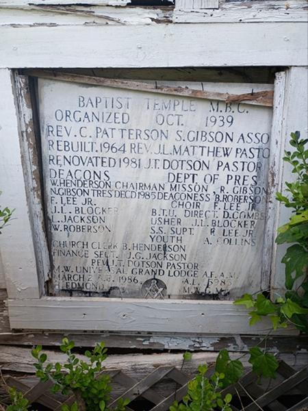 Deep cleaning, polishing, and letter repainting for a flush bronze/black granite monument in Louisiana / Before