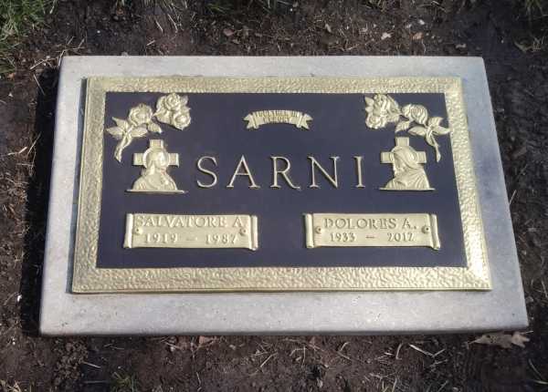 Fully restored and deep-cleaned condition of metal flush grave marker in New Jersey after Tending service