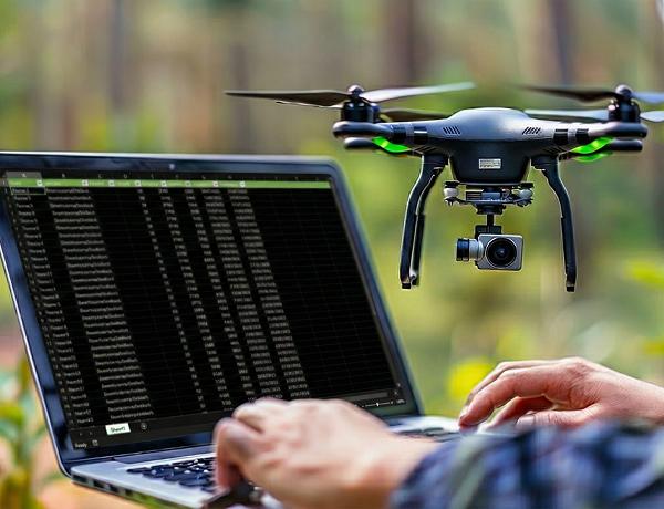 Tending specialist using GPS and drone technology to locate a grave site